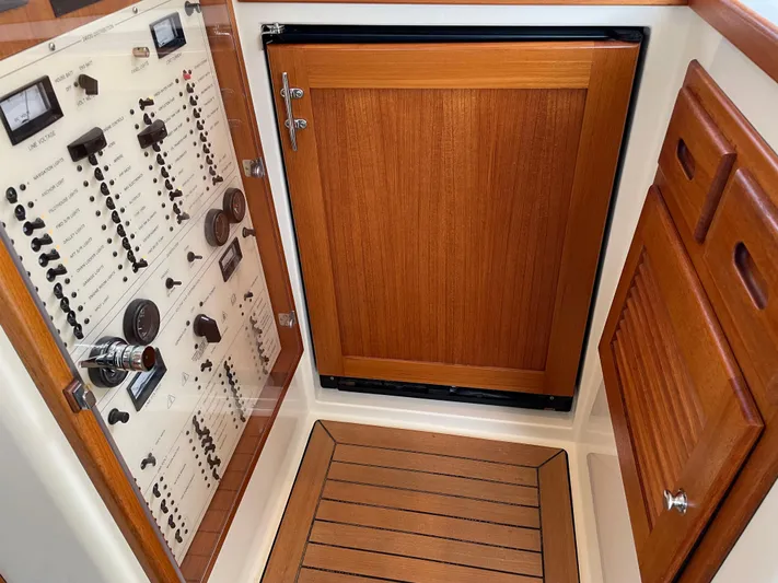 Flight Yacht Photos Pics Control panel and wooden cabinetry inside a 2009 San Juan 48 yacht.