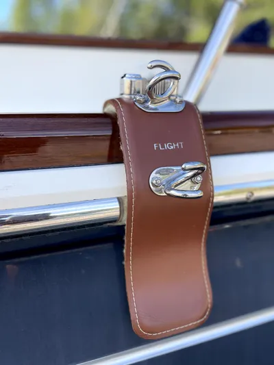 Flight Yacht Photos Pics Leather boat accessory on 2009 San Juan 48, featuring "FLIGHT" engraving.