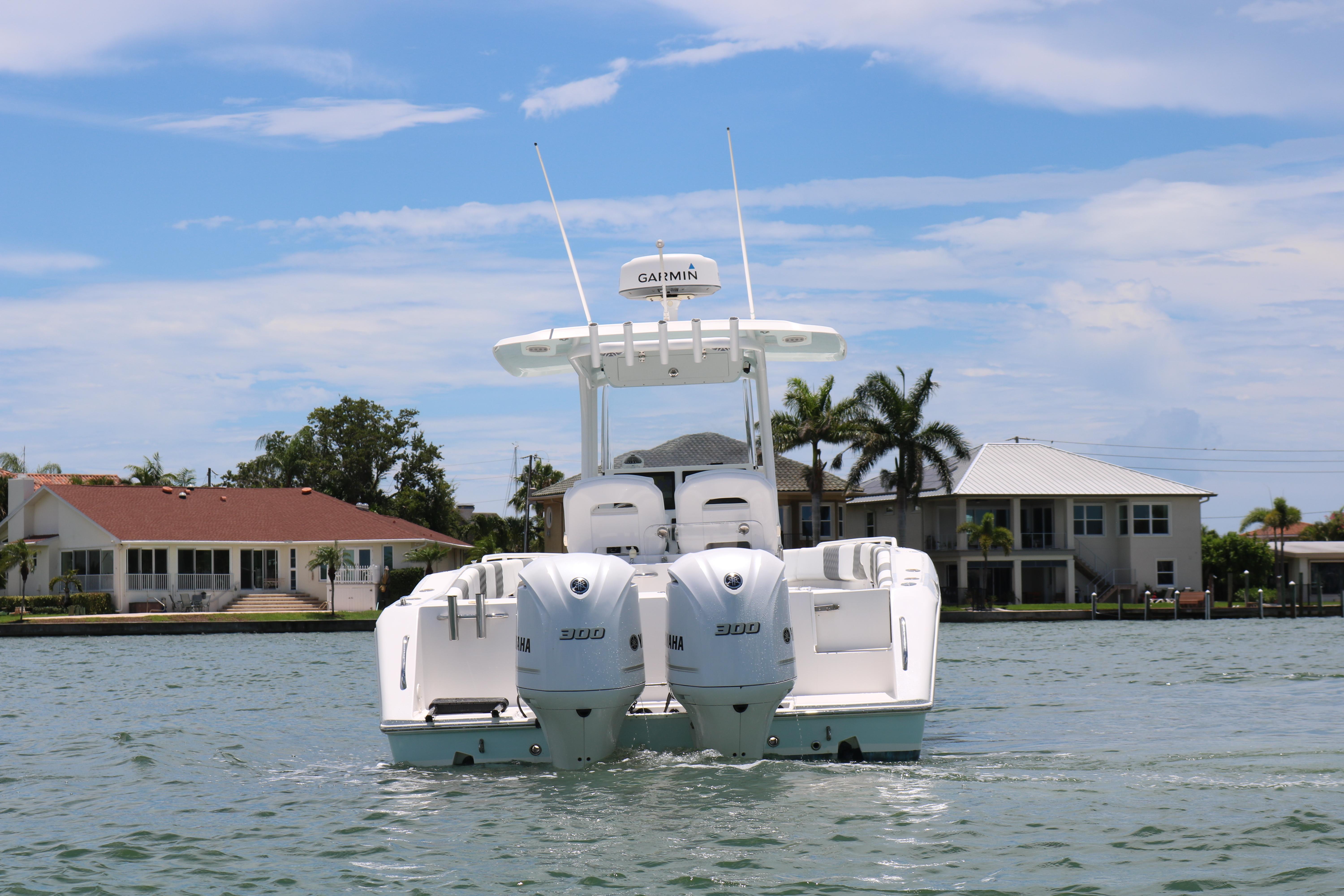2016 Stamas 317 Tarpon boat with twin Suzuki engines on the water.