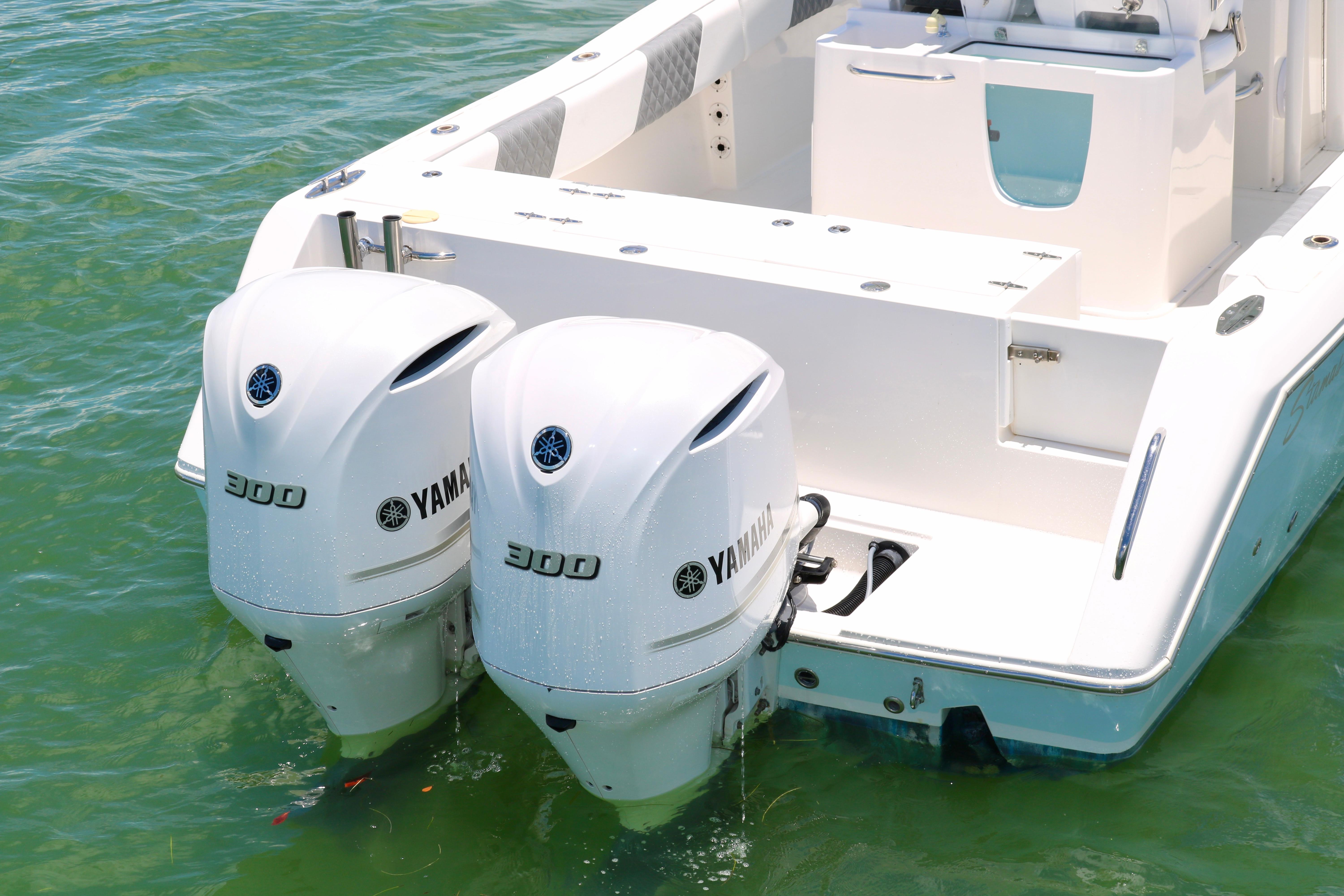 2016 Stamas 317 Tarpon with twin Yamaha 300 outboard engines in water.