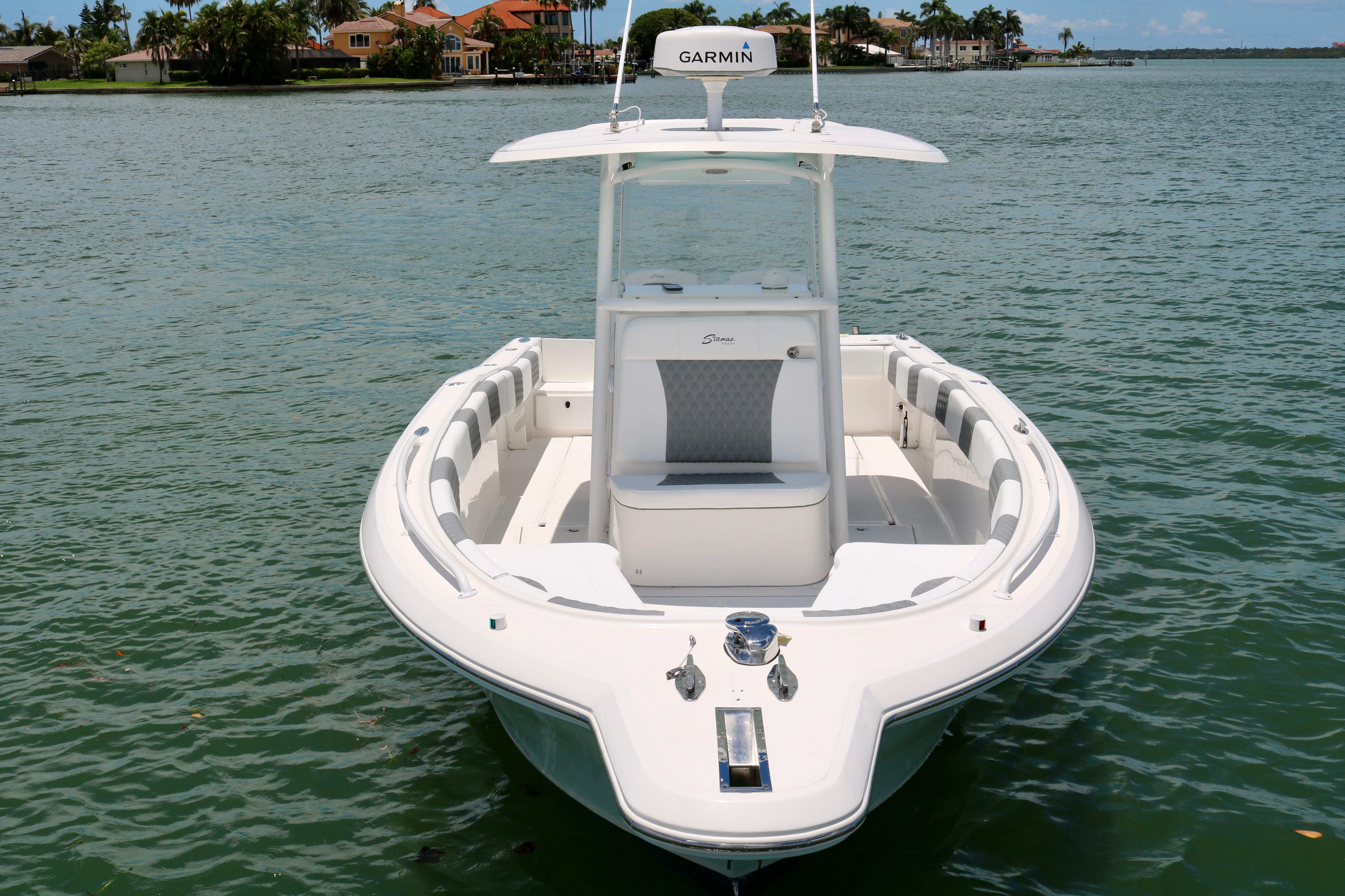 2016 Stamas 317 Tarpon boat on calm waters.