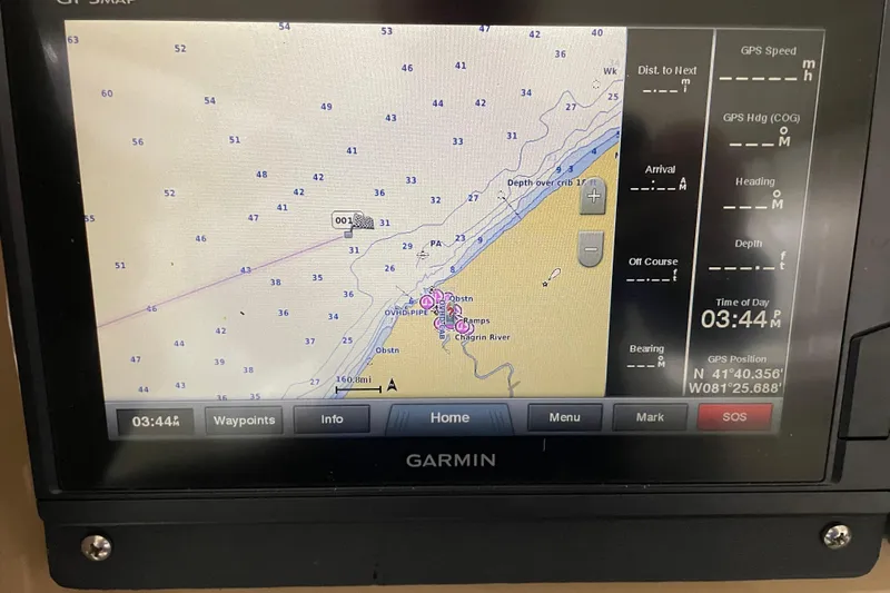  Yacht Photos Pics Garmin GPS display on 2004 Carver 460 Voyager, showing nautical map and coordinates.