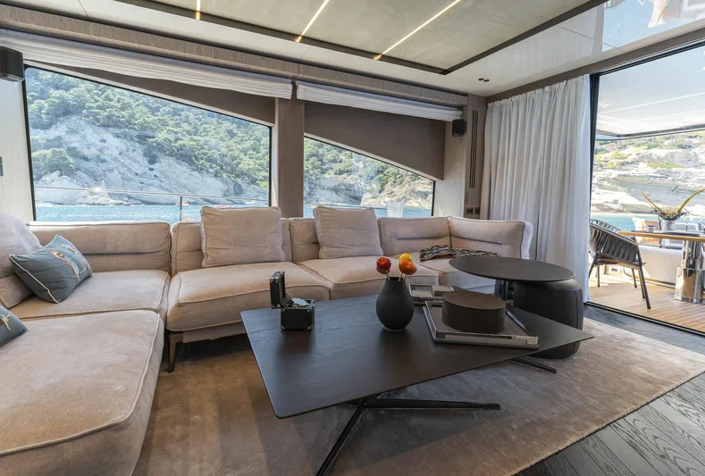 Orca I Yacht Photos Pics Luxurious interior of 2022 Cranchi Settantotto 78 yacht with elegant seating and scenic views.
