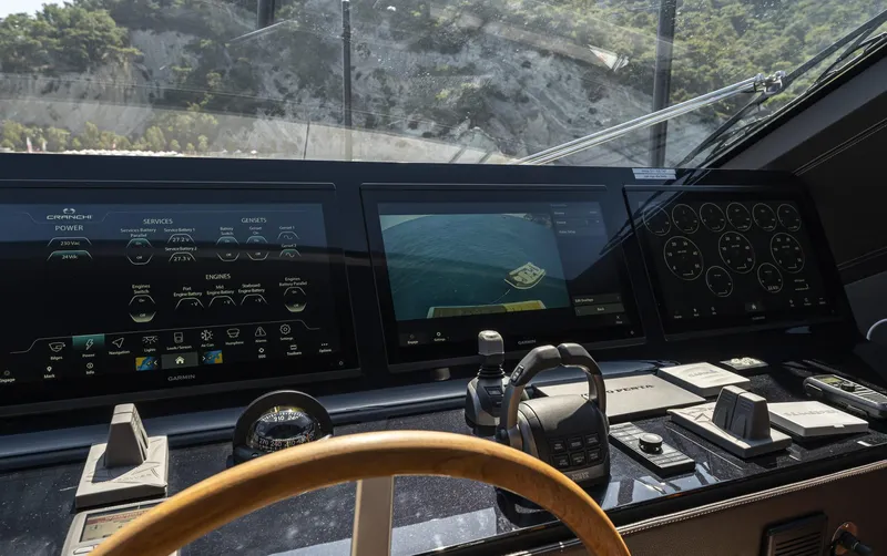 Orca I Yacht Photos Pics Control panel of 2022 Cranchi Settantotto 78 yacht with advanced navigation displays.