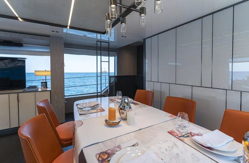 Orca I Yacht Photos Pics Luxurious dining area on 2022 Cranchi Settantotto 78 yacht with ocean view.
