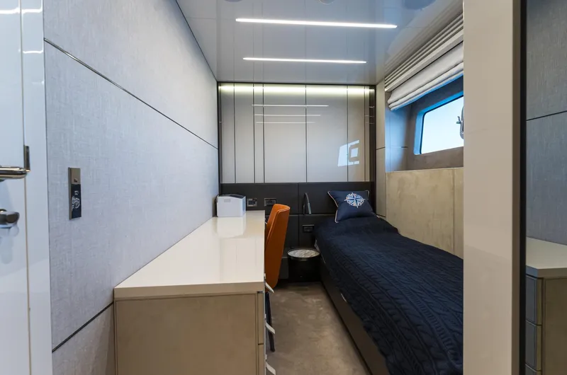 Orca I Yacht Photos Pics Luxurious cabin interior of 2022 Cranchi Settantotto 78 yacht with sleek design and modern furnishings.