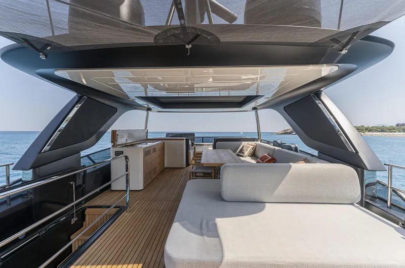 Orca I Yacht Photos Pics Luxurious 2022 Cranchi Settantotto 78 yacht deck with modern seating and ocean view.