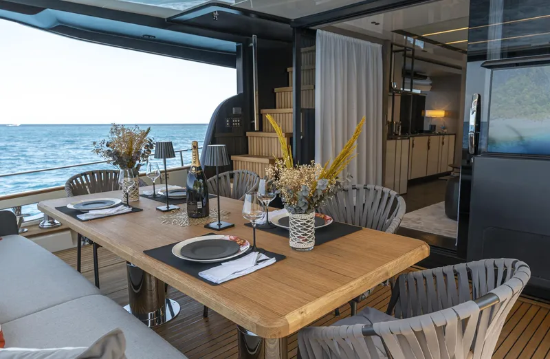 Orca I Yacht Photos Pics Luxurious dining area on 2022 Cranchi Settantotto 78 yacht with ocean view.