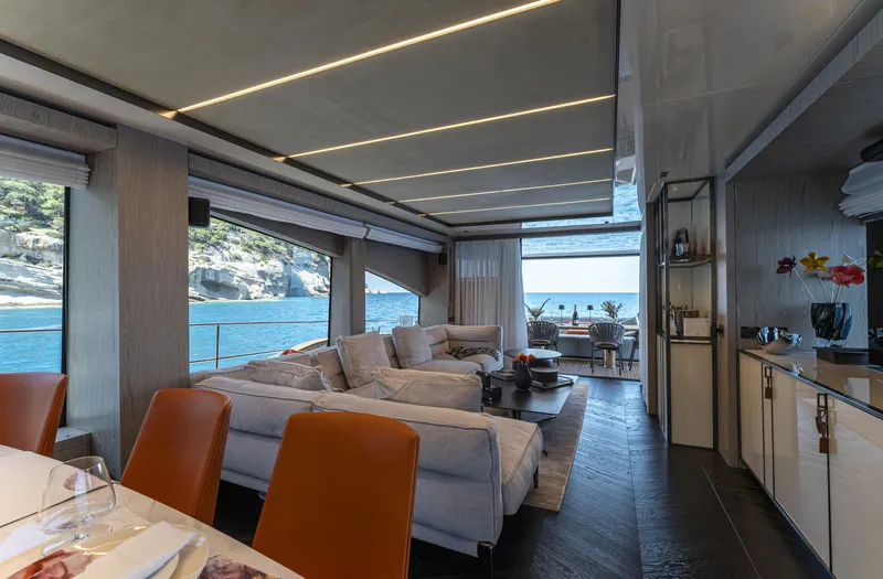 Orca I Yacht Photos Pics Luxurious interior of 2022 Cranchi Settantotto 78 yacht with ocean view.