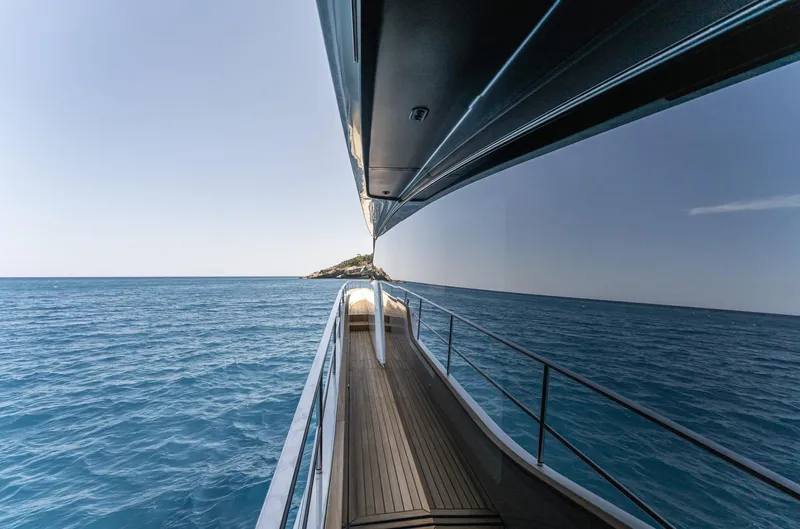 Orca I Yacht Photos Pics Side view of 2022 Cranchi Settantotto 78 yacht on open sea.