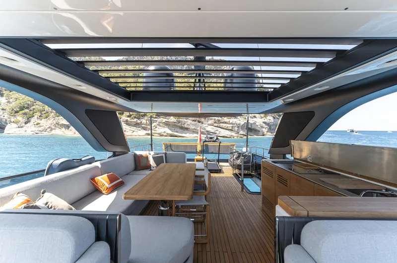 Orca I Yacht Photos Pics Luxurious 2022 Cranchi Settantotto 78 yacht interior with elegant seating and ocean view.