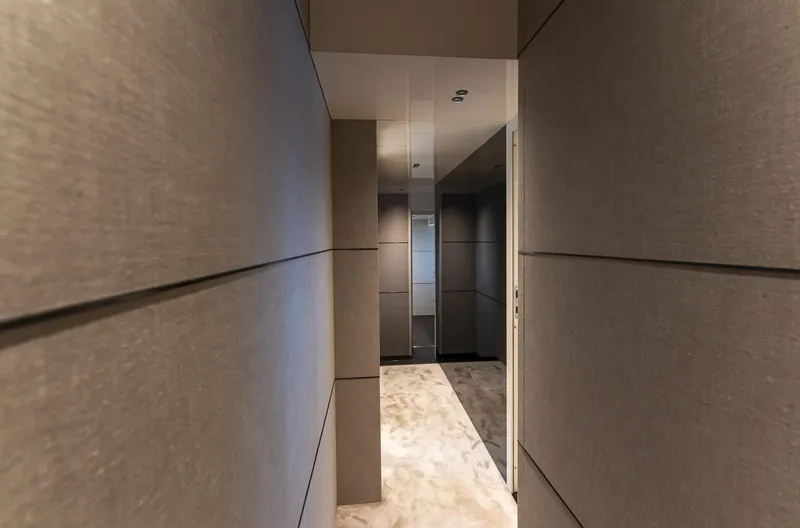 Orca I Yacht Photos Pics Luxurious interior hallway of 2022 Cranchi Settantotto 78 yacht with modern design.