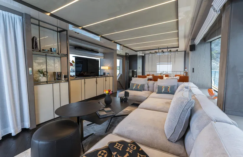 Orca I Yacht Photos Pics Luxurious interior of 2022 Cranchi Settantotto 78 yacht with modern furnishings and elegant decor.