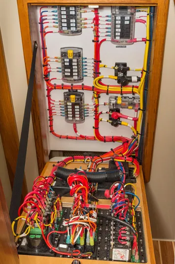  Yacht Photos Pics Electrical panel of 2026 Aspen C120 Flybridge with organized wiring and circuit breakers.