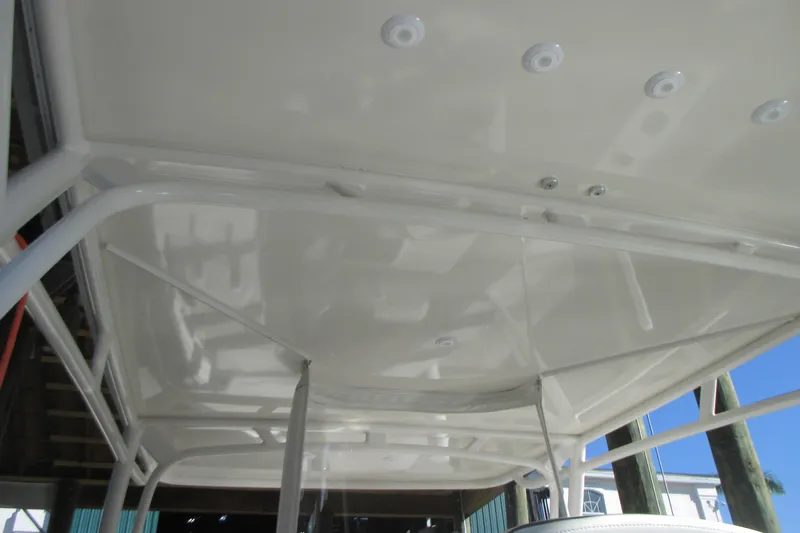  Yacht Photos Pics 2012 Jupiter 30 FS boat hardtop with mounted lights and sturdy framework.