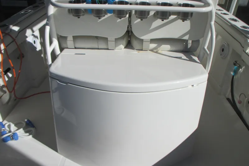  Yacht Photos Pics 2012 Jupiter 30 FS boat interior with rod holders and storage compartment.