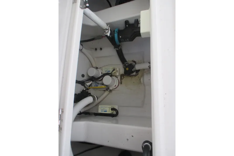  Yacht Photos Pics Bilge area of 2012 Jupiter 30 FS boat with visible plumbing components.