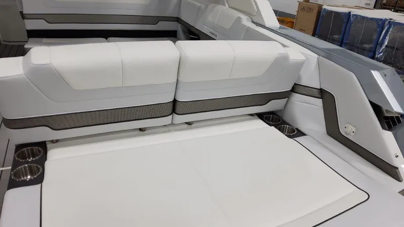  Yacht Photos Pics 2023 Formula 380 Super Sport Crossover OB interior seating area with white upholstery.