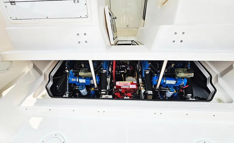 Fidgit Yacht Photos Pics Engine compartment of 2006 Tiara Yachts 2900 Open Classic, showcasing dual engines.