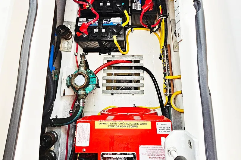 Fidgit Yacht Photos Pics Engine compartment of 2006 Tiara Yachts 2900 Open Classic with batteries and wiring.