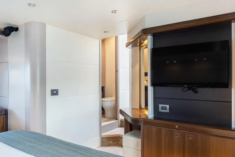 Triangle Yacht Photos Pics Luxurious interior of 2019 Absolute 58 FLY yacht with modern amenities and sleek design.