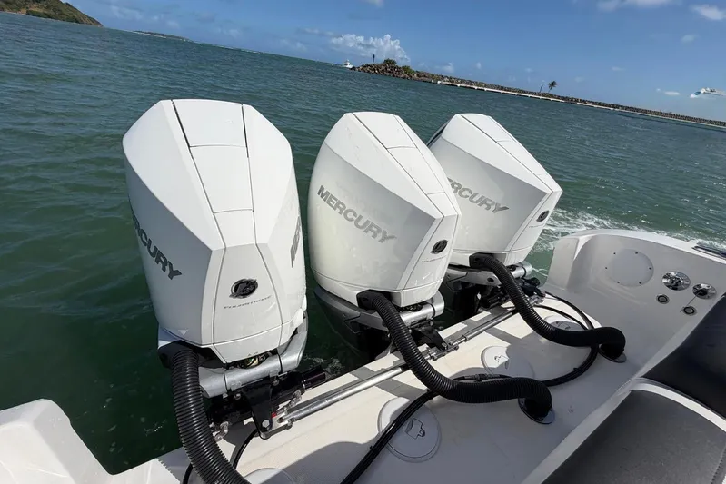  Yacht Photos Pics Triple Mercury outboard engines on 2023 Fountain 34 Center Console boat.