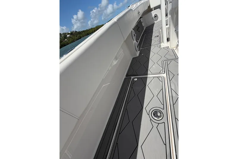  Yacht Photos Pics 2023 Fountain 34 Center Console boat deck with sleek design and ocean view.
