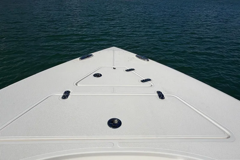 Yacht Photos Pics Bow of 2023 Fountain 34 Center Console boat on water.