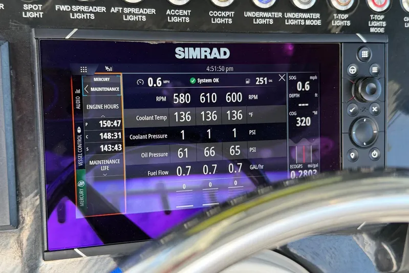  Yacht Photos Pics Simrad display on 2023 Fountain 34 Center Console showing engine metrics and navigation data.