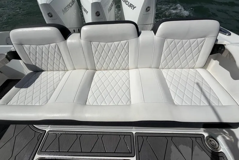  Yacht Photos Pics Luxurious seating on 2023 Fountain 34 Center Console boat with diamond-stitched upholstery.