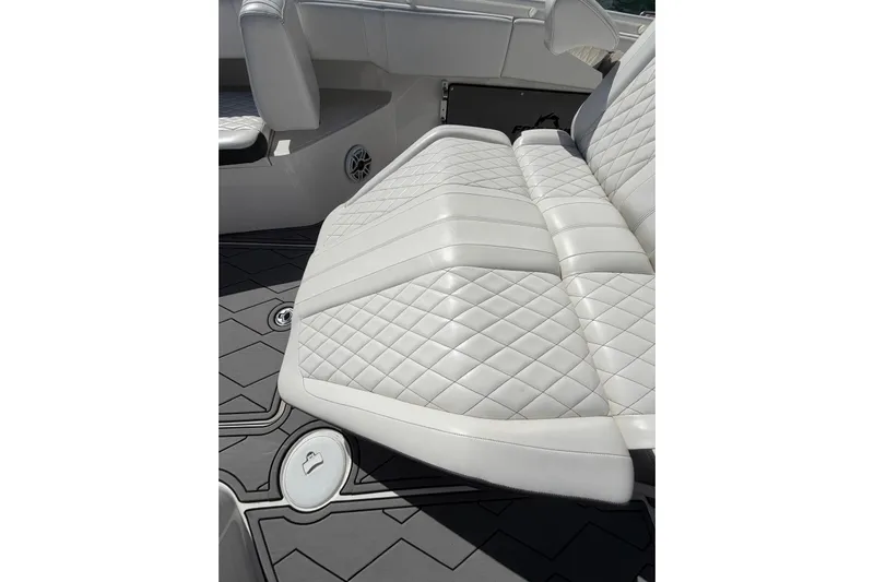  Yacht Photos Pics 2023 Fountain 34 Center Console boat with luxurious white quilted seating.