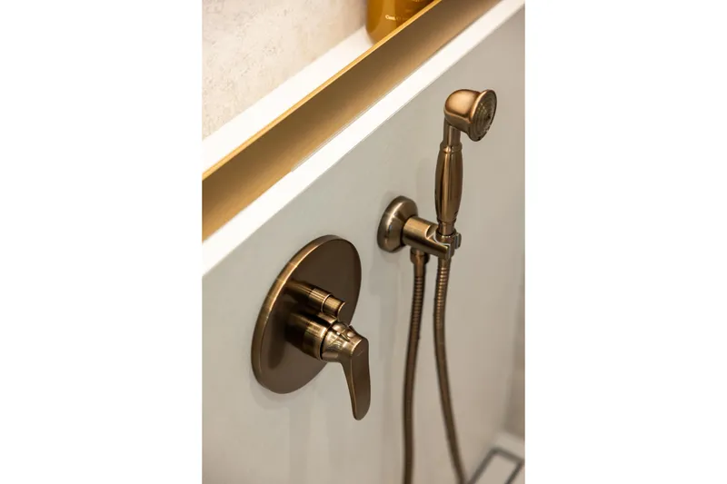 Spice Of Life II Yacht Photos Pics Luxury bronze shower fixtures on 2025 Sunreef 60 yacht.