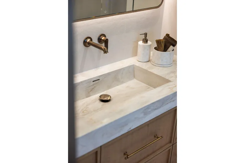 Spice Of Life II Yacht Photos Pics Luxurious bathroom sink with marble countertop on Sunreef 60 yacht, 2025 model.