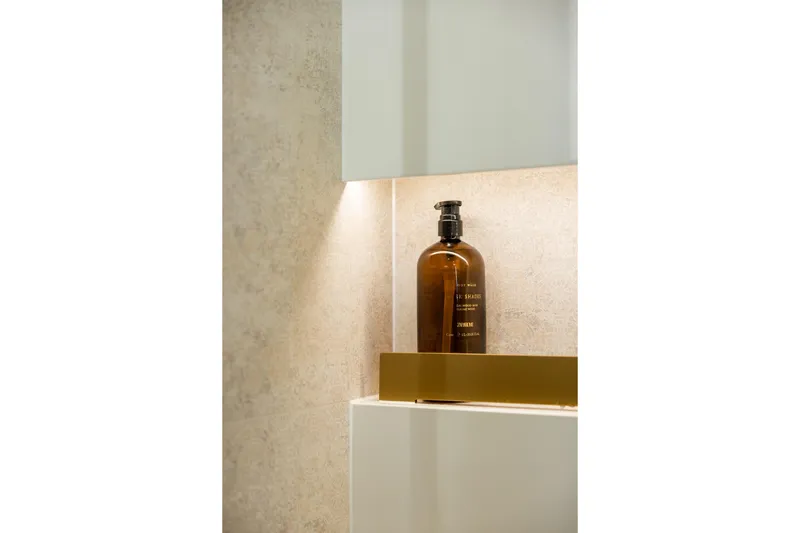 Spice Of Life II Yacht Photos Pics Illuminated shelf with a brown bottle on Sunreef 60 yacht, 2025 model.