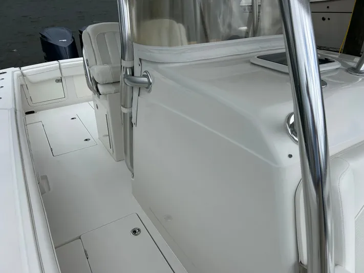  Yacht Photos Pics 2013 Jupiter 34 boat interior with white seating and stainless steel accents.