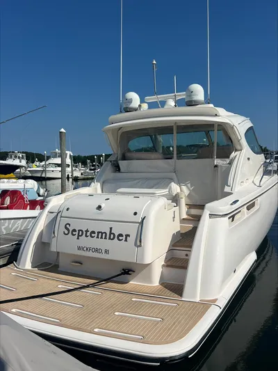 September Yacht Photos Pics 2013 Tiara Yachts 4500 Sovran docked, rear view, clear sky, Wickford, RI.