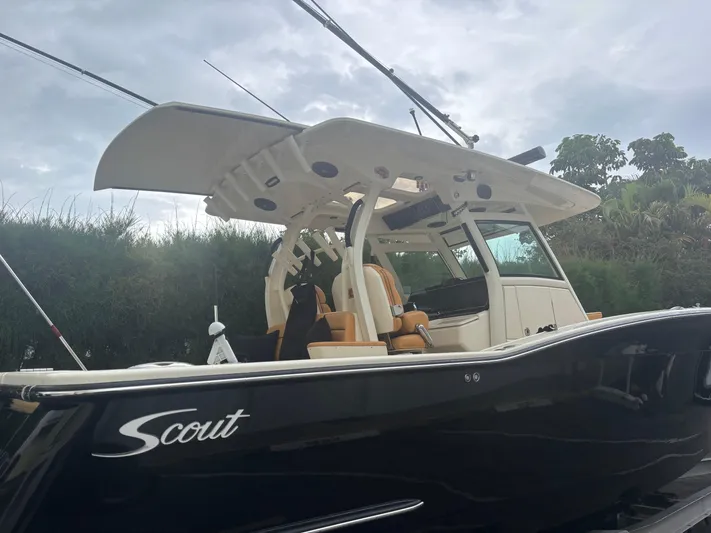 Yacht Photos Pics 2014 Scout 350 LXF boat with sleek black hull and modern design.