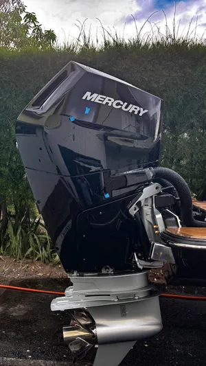  Yacht Photos Pics 2014 Scout 350 LXF with Mercury outboard motor, parked outdoors.