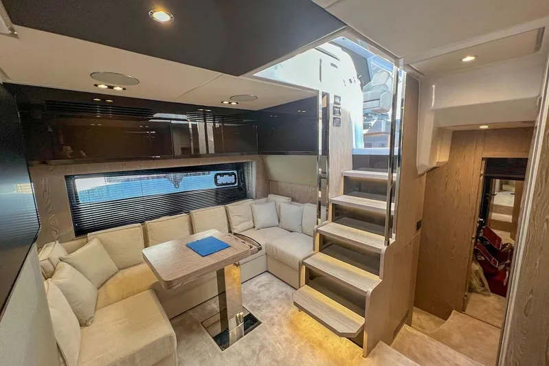  Yacht Photos Pics Luxurious interior of 2024 Azimut Atlantis 51 yacht with modern seating and elegant design.