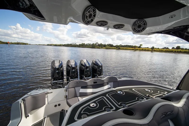  Yacht Photos Pics Luxury MTI V42 boat interior with quad engines on a scenic waterway, 2020 model.