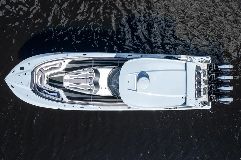  Yacht Photos Pics Aerial view of 2020 MTI V42 yacht on dark water.