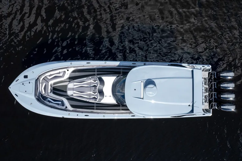  Yacht Photos Pics Aerial view of 2020 MTI V42 boat on dark water.