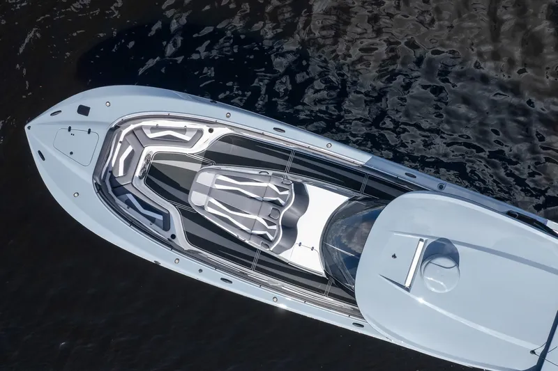  Yacht Photos Pics Aerial view of 2020 MTI V42 boat on dark water.