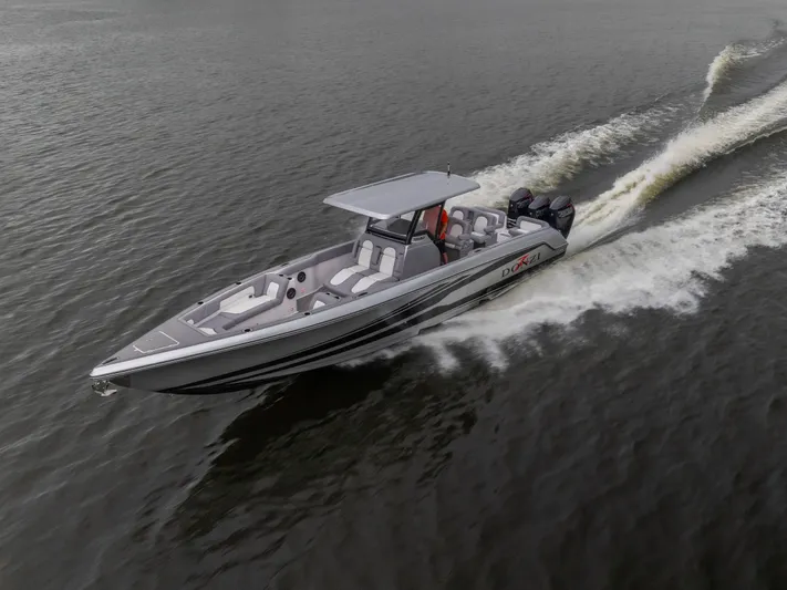  Yacht Photos Pics 2025 Donzi 39 VRZ speedboat cruising on open water, showcasing sleek design and powerful engines.