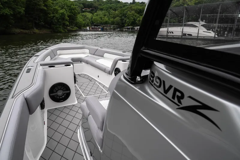  Yacht Photos Pics 2025 Donzi 39 VRZ boat interior with sleek seating and modern design on a scenic lake.