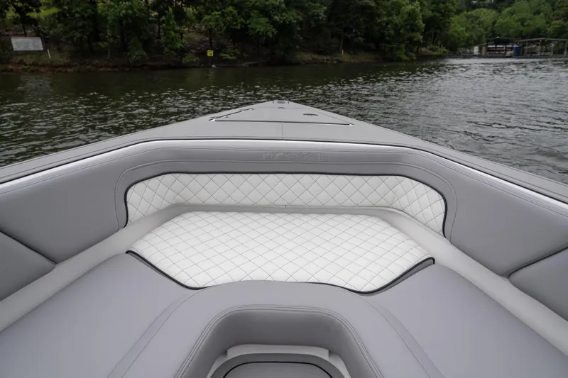  Yacht Photos Pics 2025 Donzi 39 VRZ boat interior with quilted seating, on a calm lake.