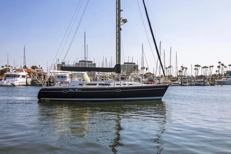 Blue Moon Yacht Photos Pics 2004 Catalina 400 MkII sailboat docked in a marina with clear skies.