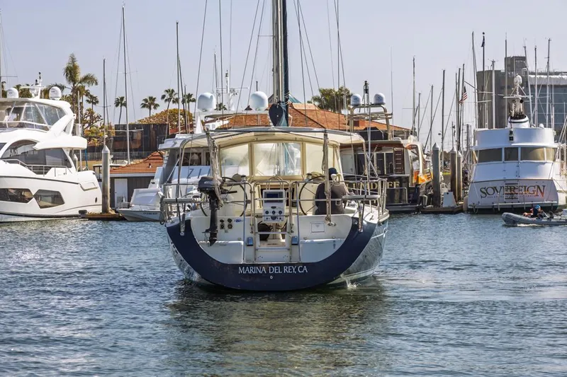 Blue Moon Yacht Photos Pics 2004 Catalina 400 MkII sailboat docked at Marina del Rey, surrounded by other yachts.