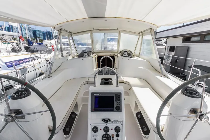 Blue Moon Yacht Photos Pics 2004 Catalina 400 MkII yacht cockpit with dual steering wheels and navigation equipment.