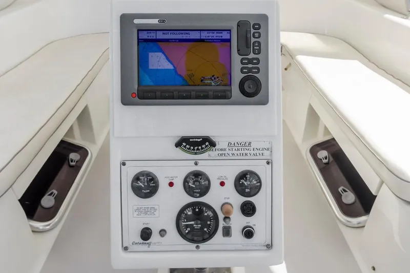 Blue Moon Yacht Photos Pics Control panel of a 2004 Catalina 400 MkII sailboat with navigation display.